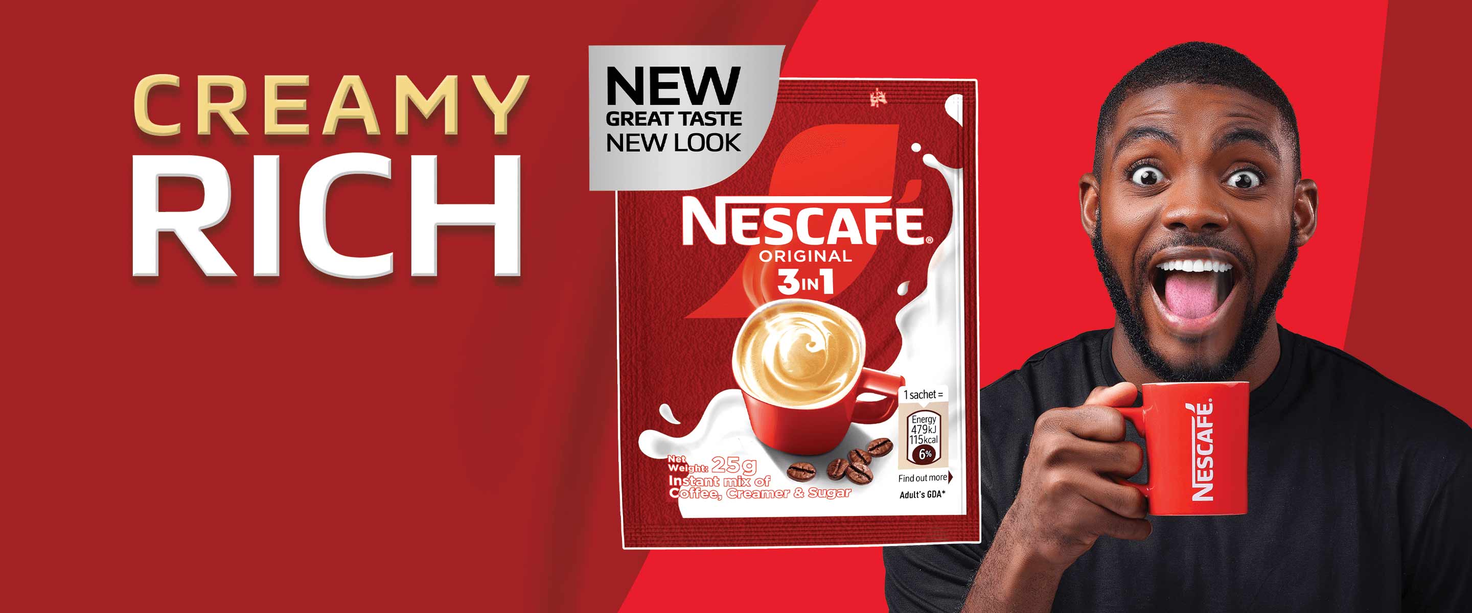 An excited man in a black shirt, holding a red NESCAFÉ mug with the NEW NESCAFÉ ORIGINAL 3in1 pack