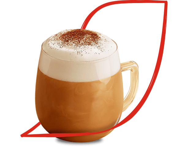 Glass mug with frothy coffee inside