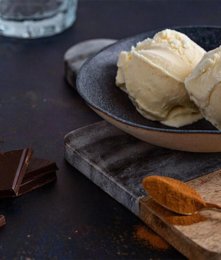 ice cream and black chocolate on table