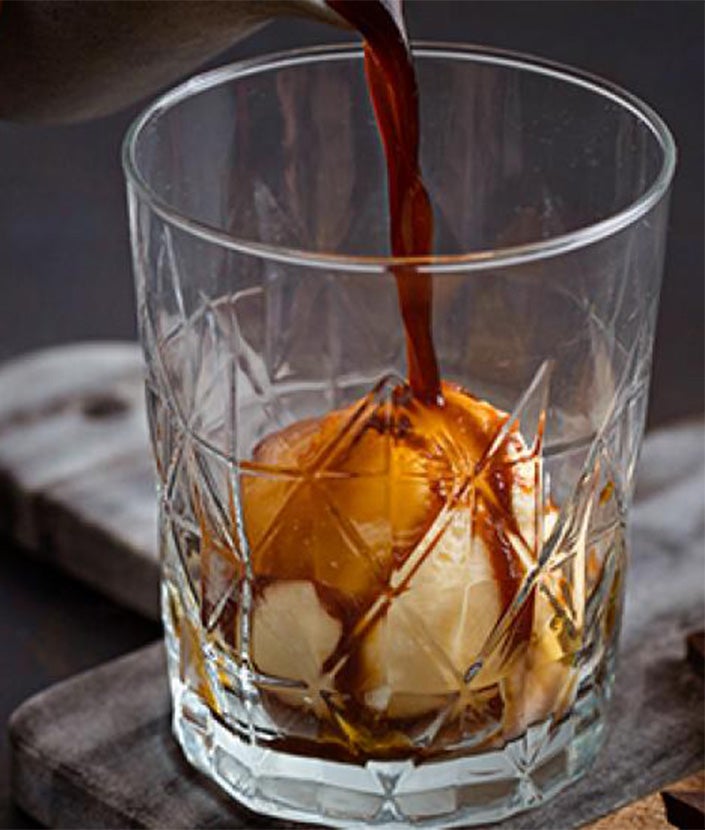 pouring coffee into ice cream cup