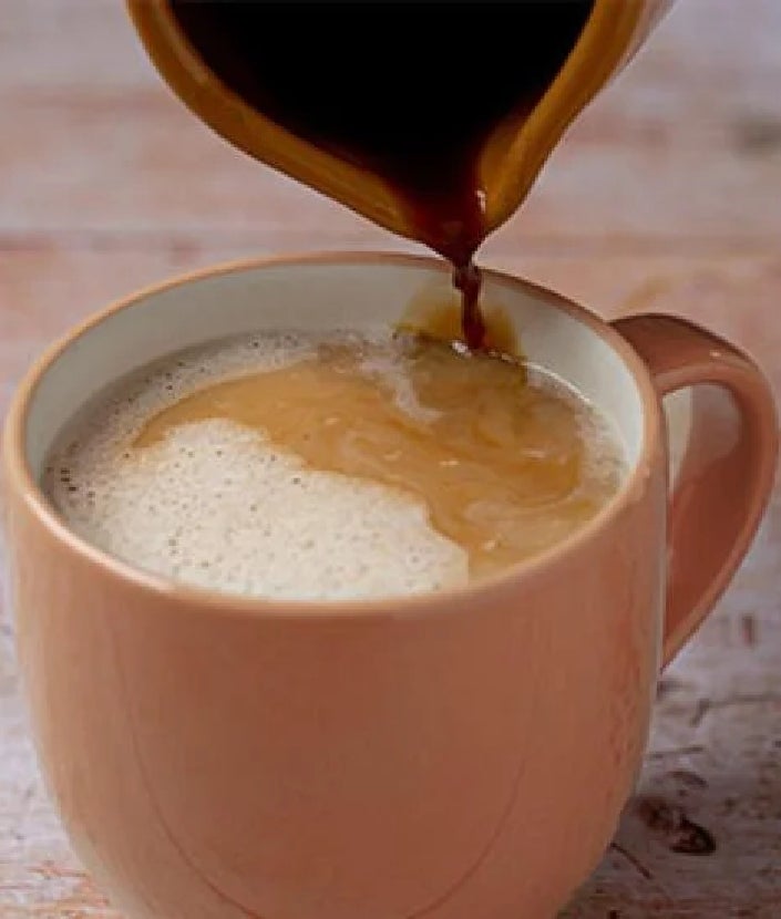 pouring coffee into cup