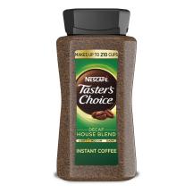 A jar of decaf Taster’s Choice House Blend instant coffee with a black lid and green label.